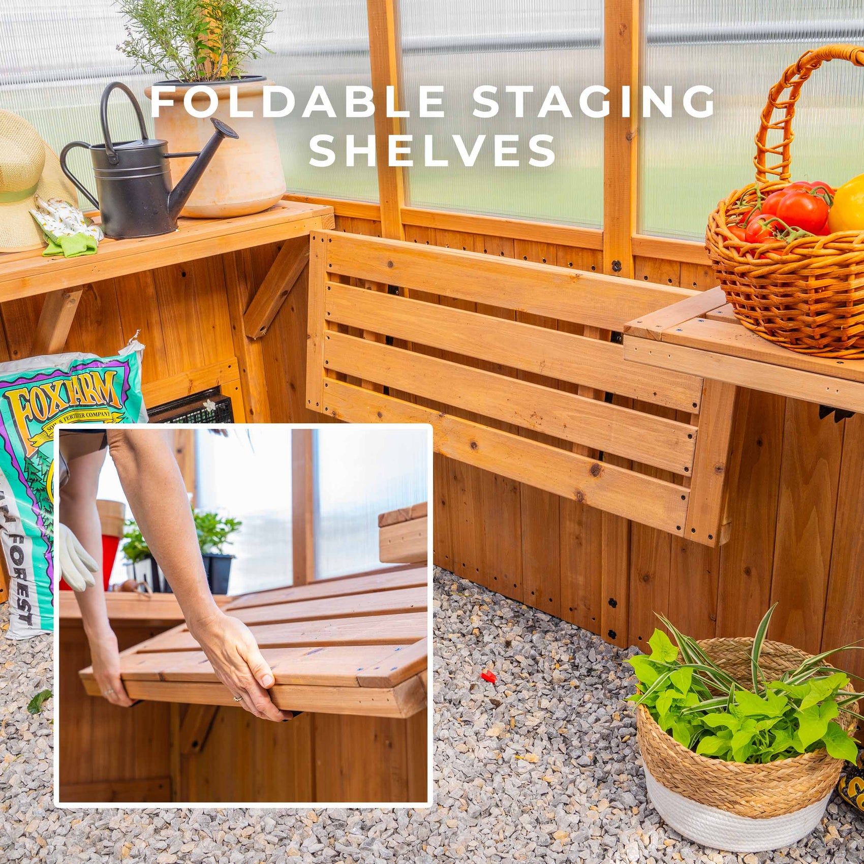 Foldable cedar staging shelves inside the Zalie greenhouse fold flat or open out for a flexible workspace.