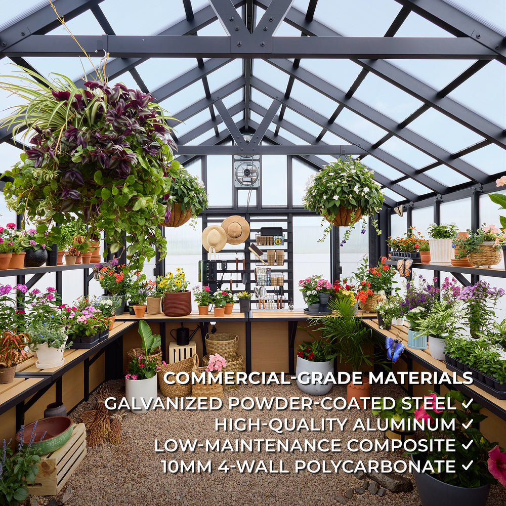 The Larkspur garden greenhouse interior filled with potted flowers, hanging baskets, and staging shelves along both sides.