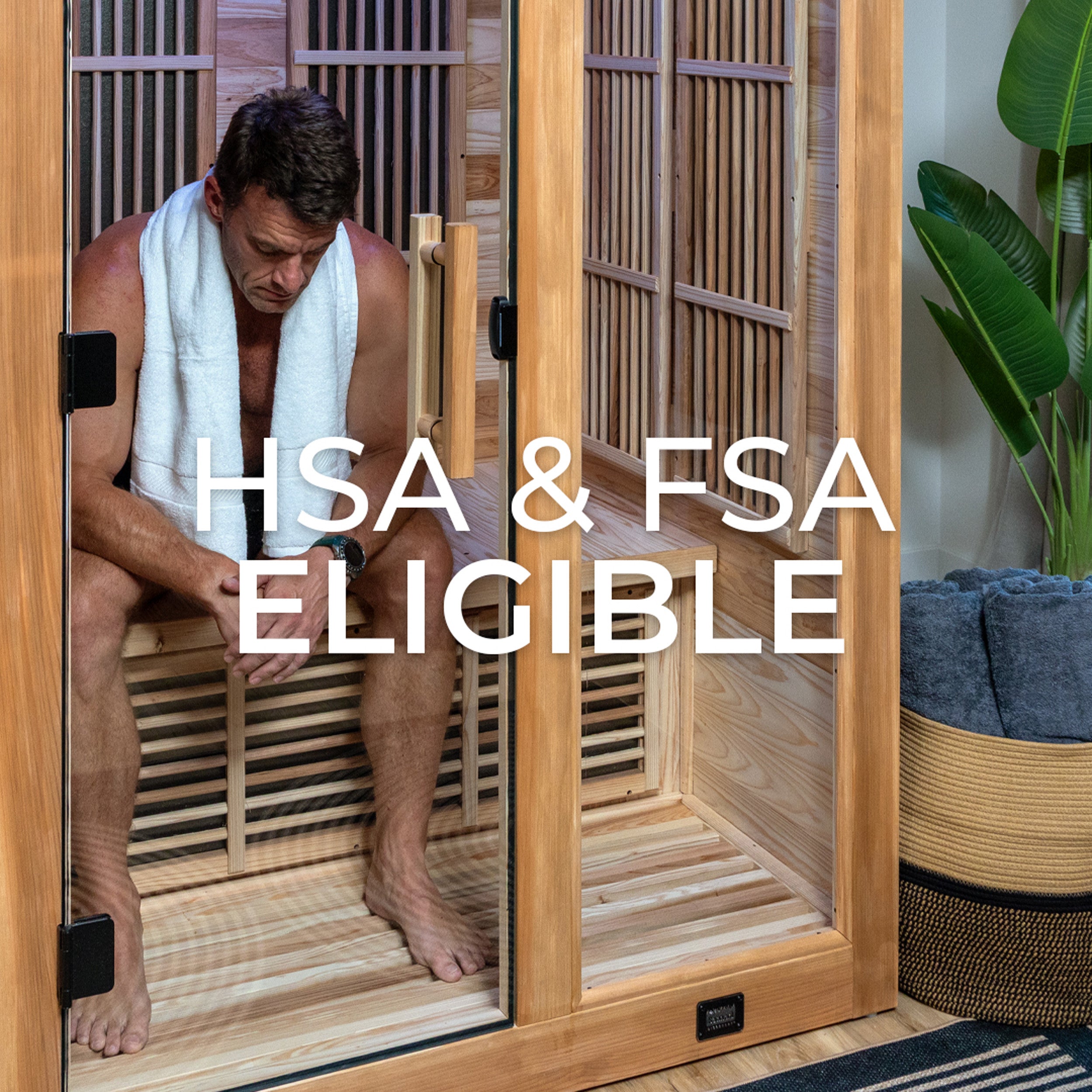 Man relaxing inside Rylan indoor infrared cedar home sauna in modern setting enjoying sauna benefits