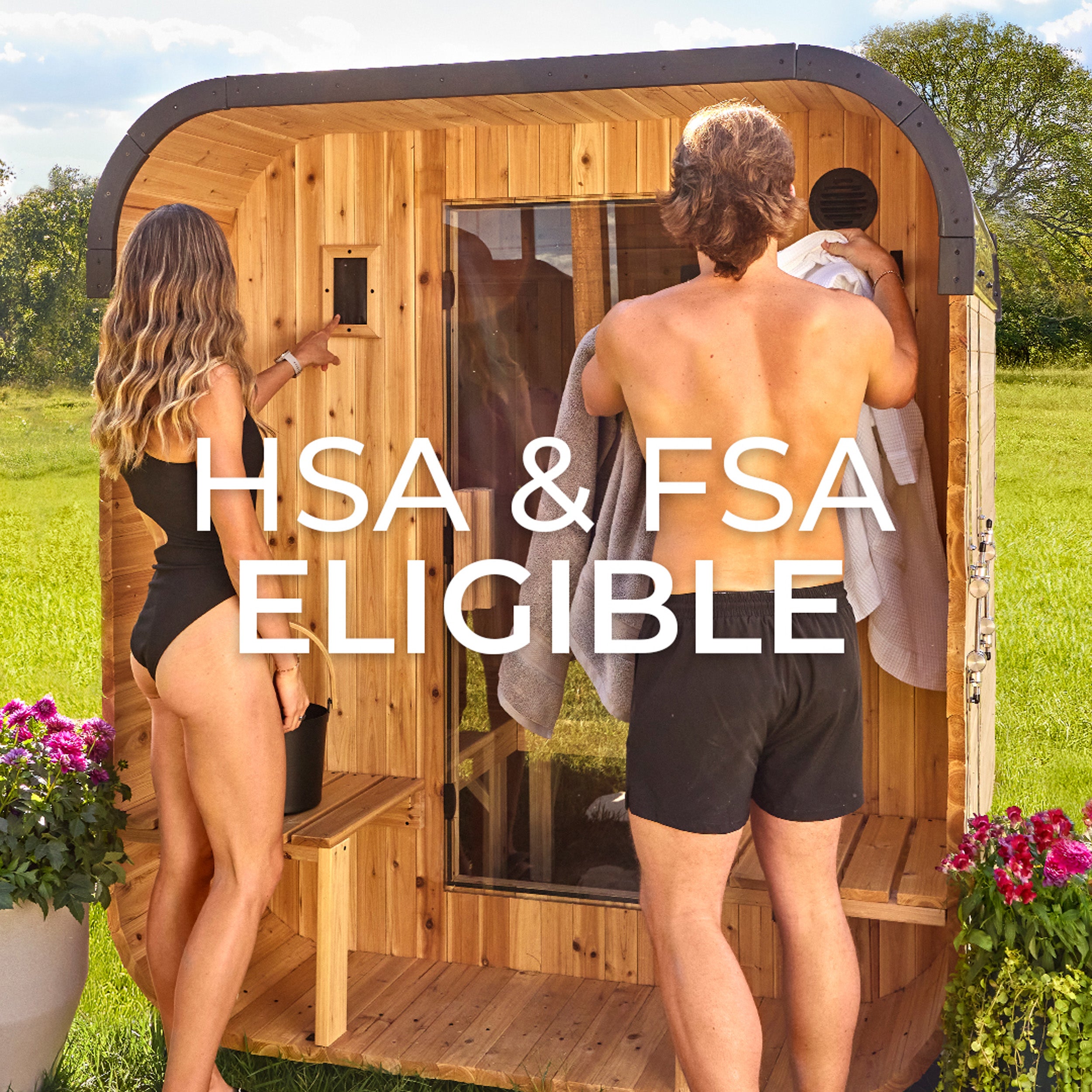 Couple next to Lennon 2-4 person outdoor cube sauna with porch in backyard setting