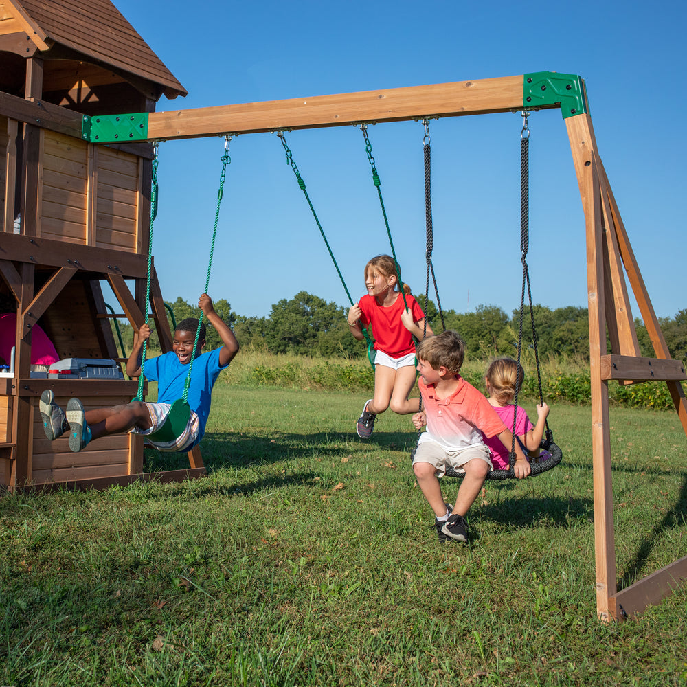 Cedar Cove Swing Set young and older kids playing