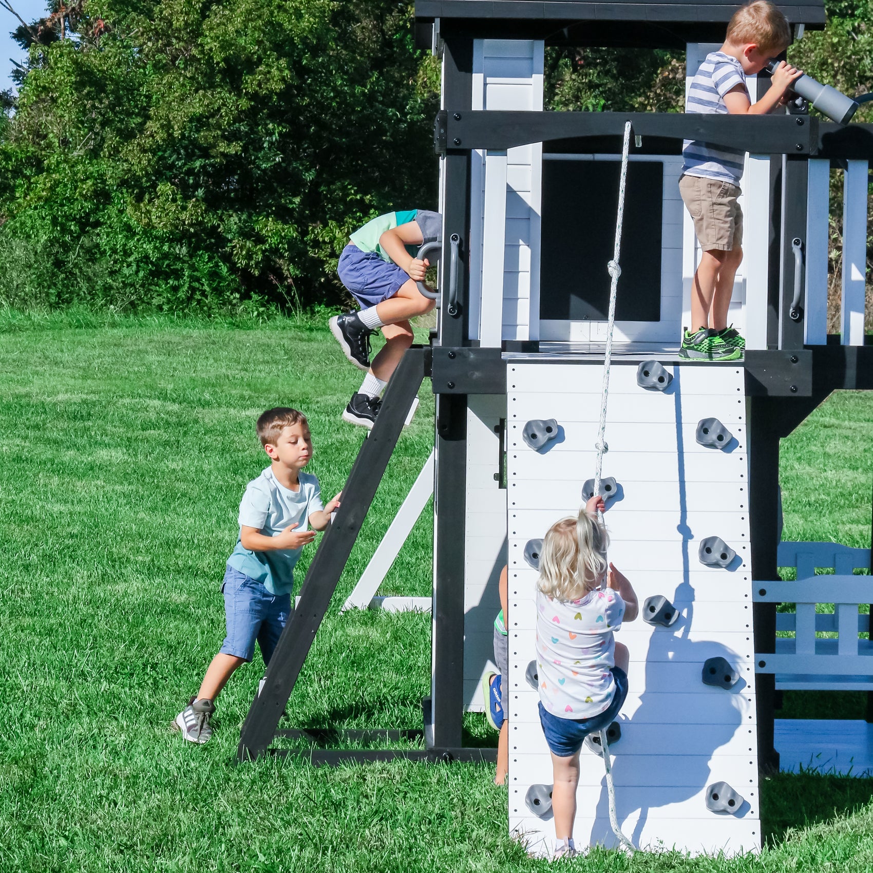 kids playing on canyon creek swing set
