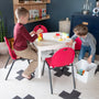 Load image into Gallery viewer, Kid playing on Stacking Chairs 
