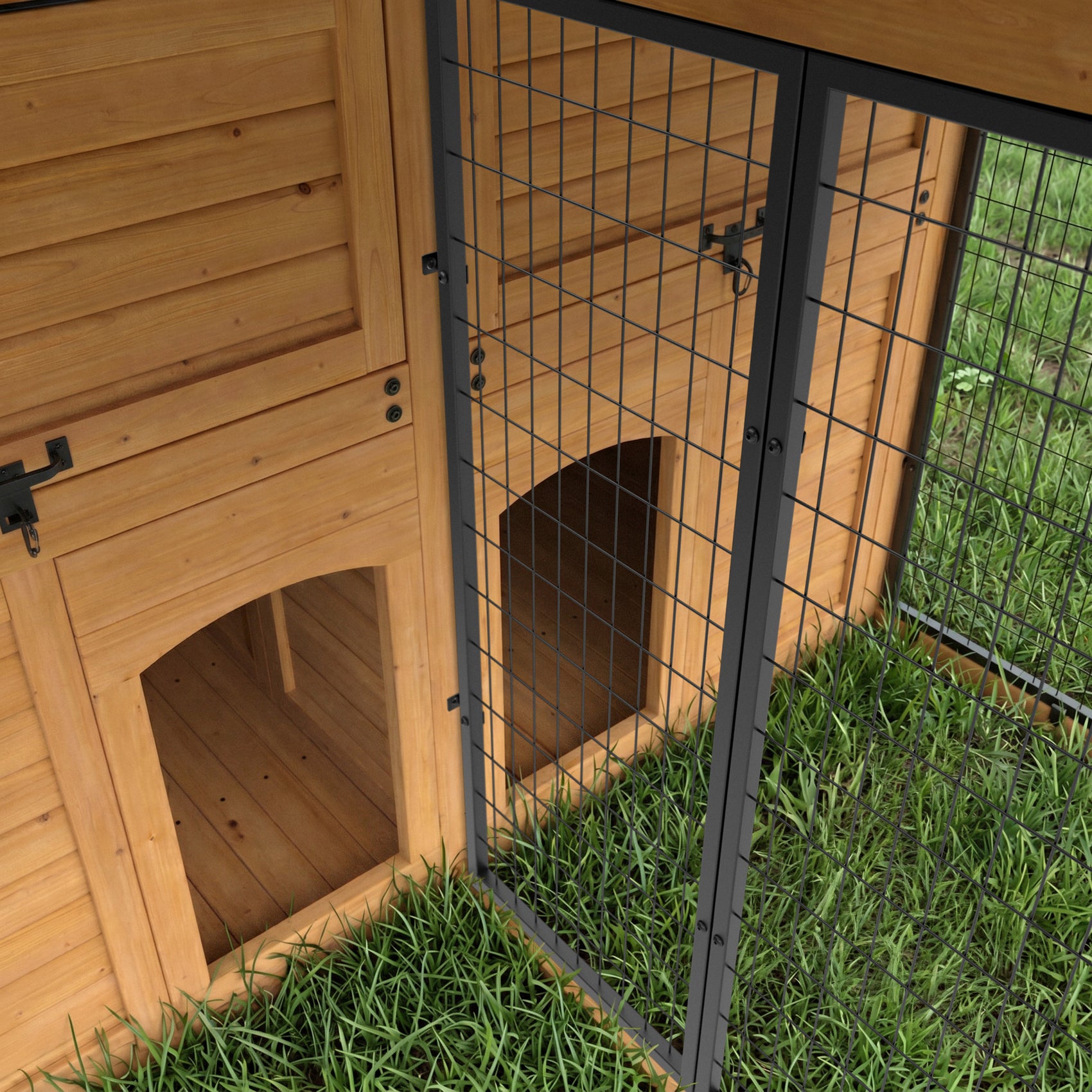 Inside cedar dog run with mesh divider panel separating two enclosure sections.