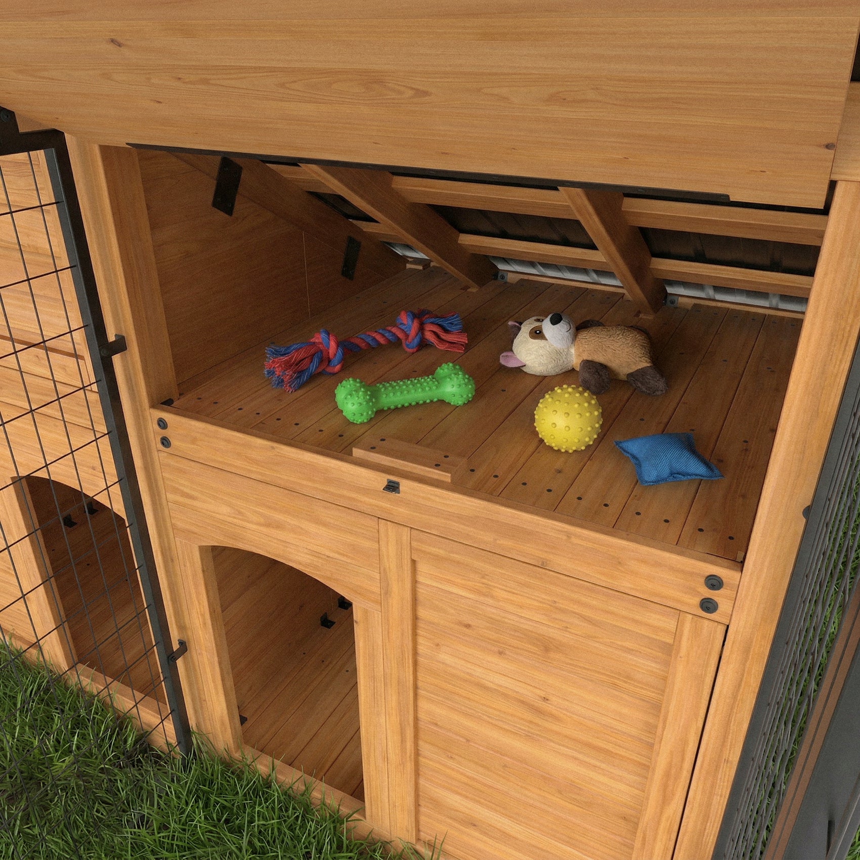 Upper storage deck on cedar dog kennel with rope toy, chew bone, and pet accessories.