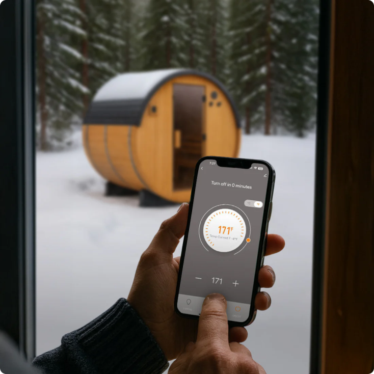Person using a smartphone app to control a wooden cabin in a snowy forest