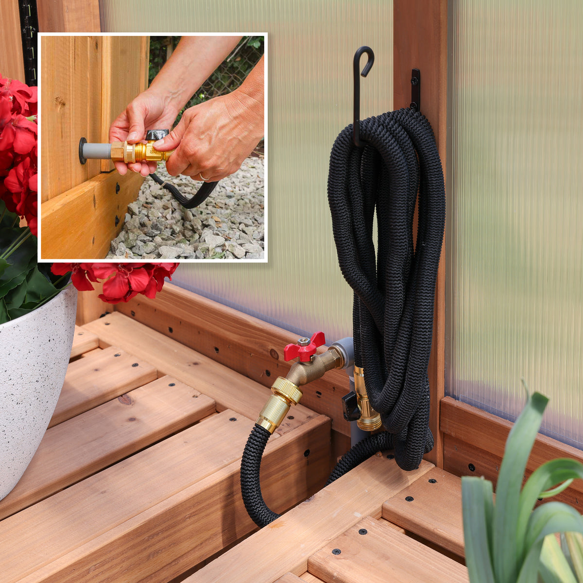 Exterior hose inlet and interior brass water spigot built into the base of the 11x7 Poppy greenhouse.