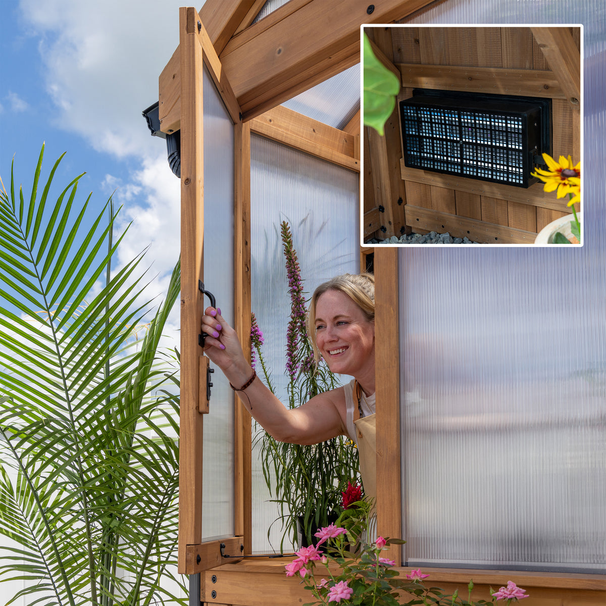 Woman opening an operable window on a year-round cedar greenhouse for passive ventilation.