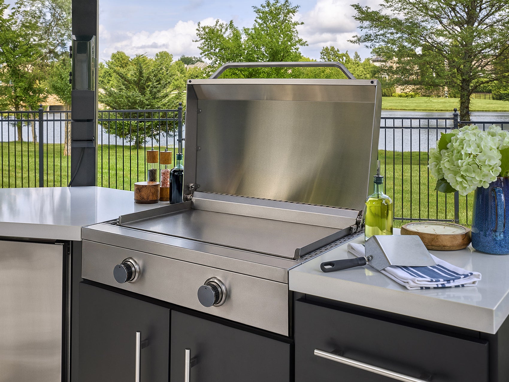 Edgemont Cove Outdoor Kitchen post-mounted weatherproof power port with protective cover fully closed