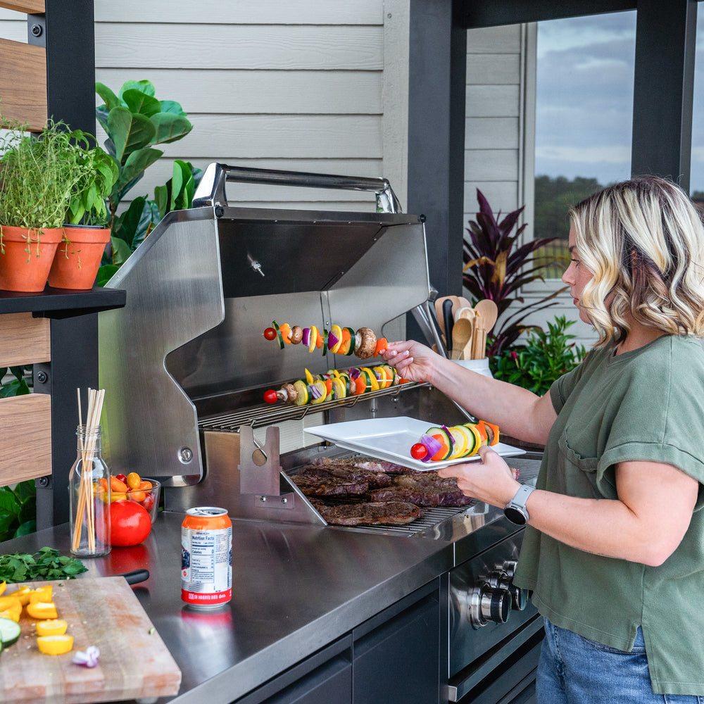 Grilling on outdoor kitchen