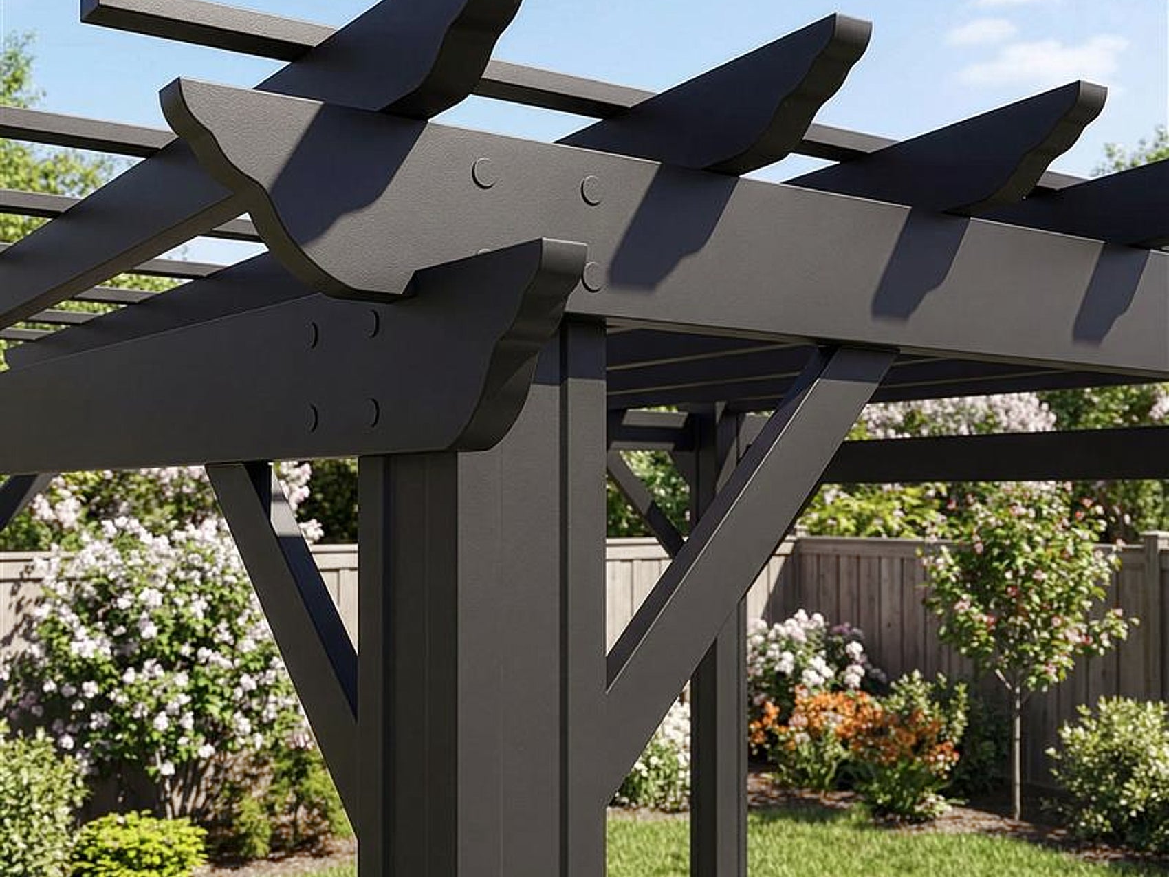 Black Stratford steel pergola bracket with decorative cutouts connecting post to overhead trellis beams in backyard setting.