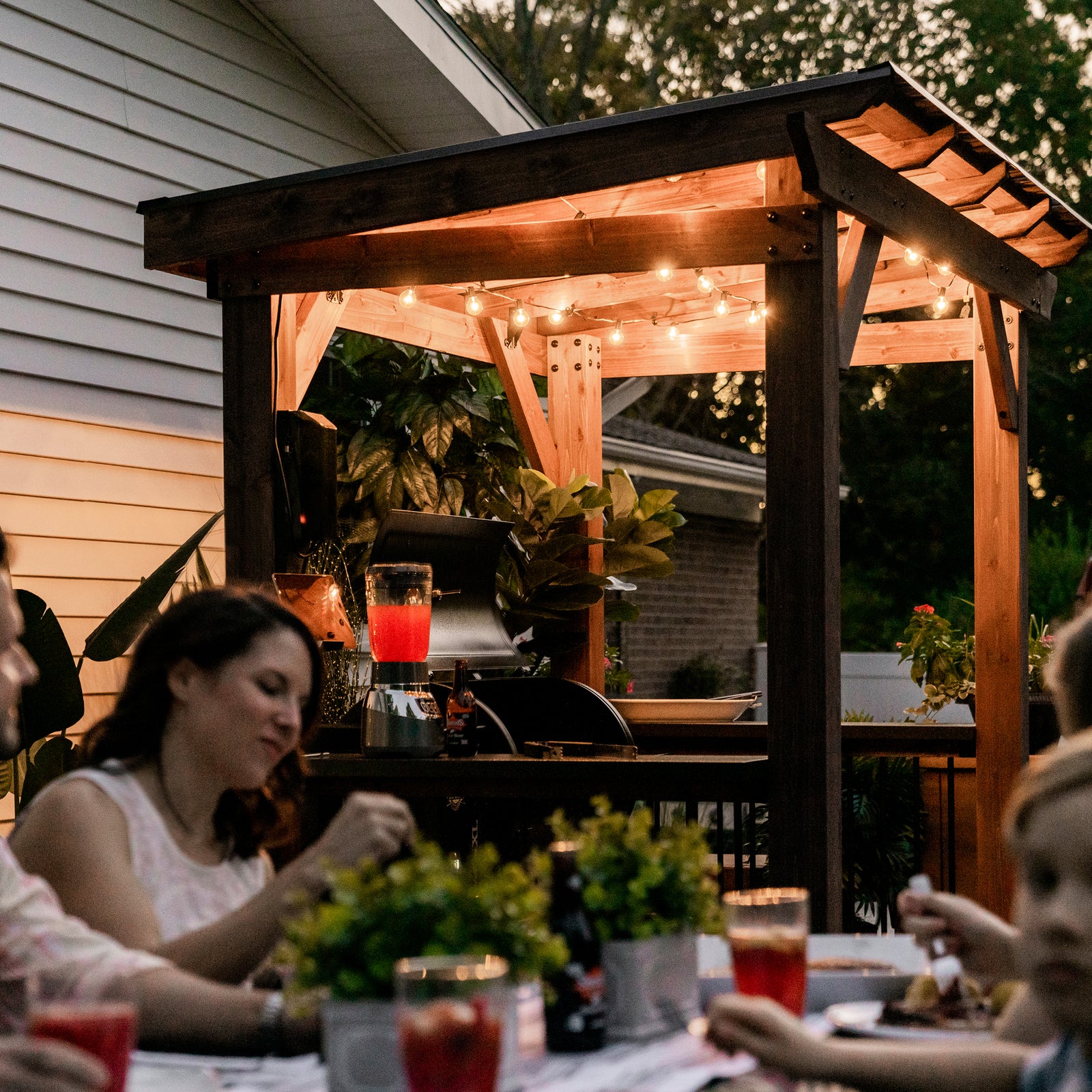 Load image into Gallery viewer, Saxony Grill Gazebo placed on deck for outdoor dinner party
