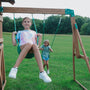 Load image into Gallery viewer, young girls on Lightning Ridge Swings
