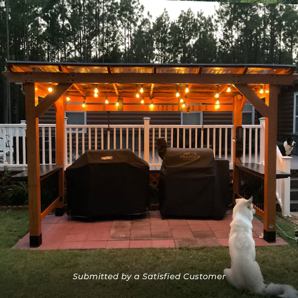 Customer photo of the Saxony XL Grill Gazebo decorated with lights