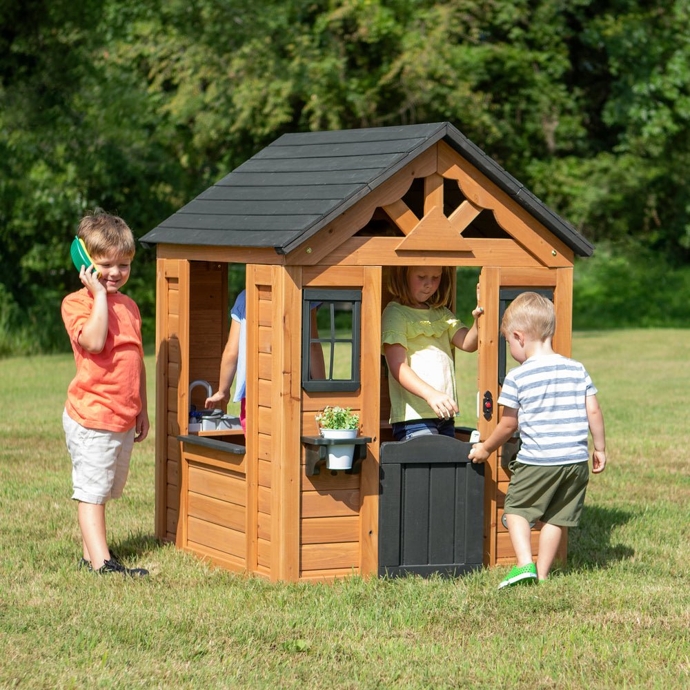 Backyard Discovery Sweetwater Cedar Kids Playhouse – Play Kitchen, Snack Bar, Working Doorbell - 15% off at Amazon